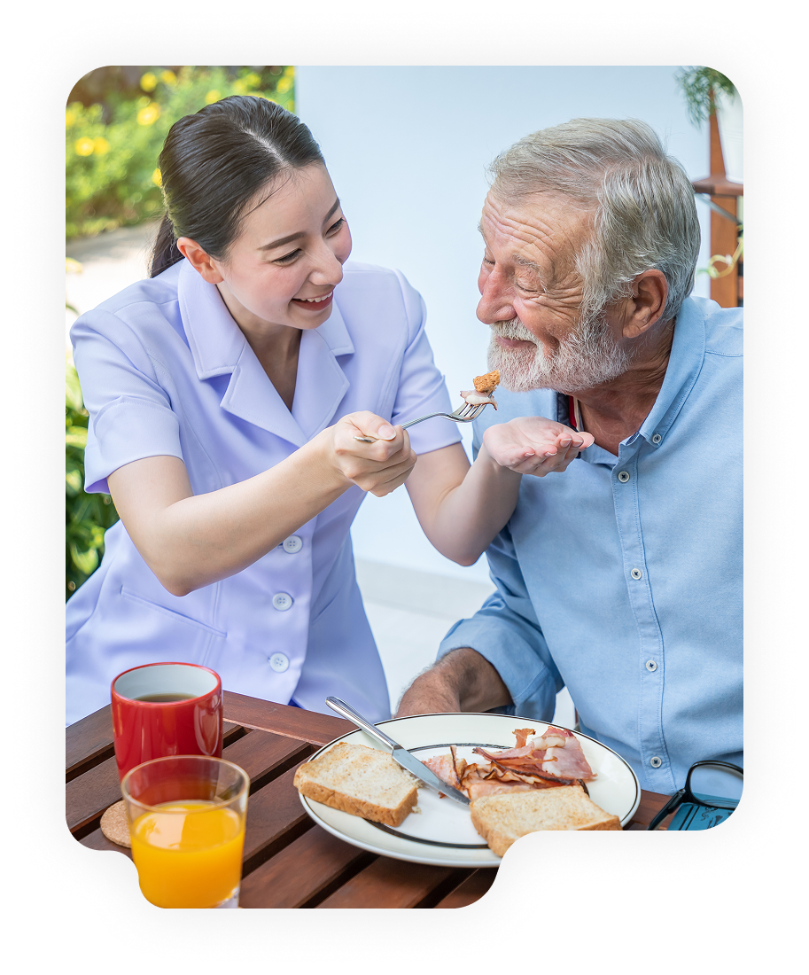 Caregiver helping elderly